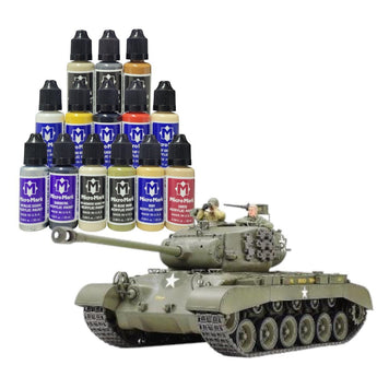Model tank with paint bottles on a white background