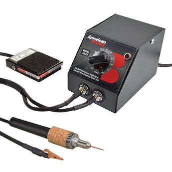 Soldering iron with foot pedal and power switch on a white background