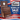 Wooden chest with open lid on a background featuring an American flag and Gerstner International branding for a Memorial Day sale.