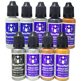 Set of Micro Mark acrylic paint bottles in various colors on a white background