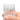 Set of small paintbrushes held between fingers against a white background