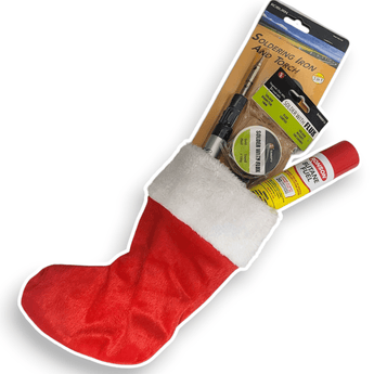 Red and white stocking with a soldering iron and flux kit on a white background