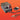 Soldering station with foot pedal and cable on an orange background
