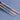 Set of paint brushes with orange bristles on a blue background