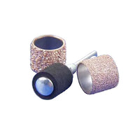 Three diamond grinding wheels on a blue background