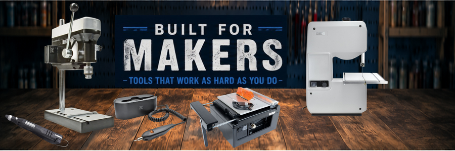 A promotional banner for a maker tool set featuring a white band saw, a metal drill press, a table saw, and other tools arranged on a wooden table with a dark blue background and the text 'BUILT FOR MAKERS'.