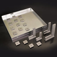 Set of metal brackets and components on a dark background