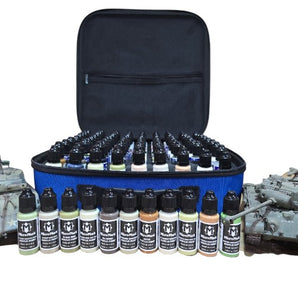 Collection of small bottles with black caps and visible branding on a blue organizer, surrounded by model tanks.